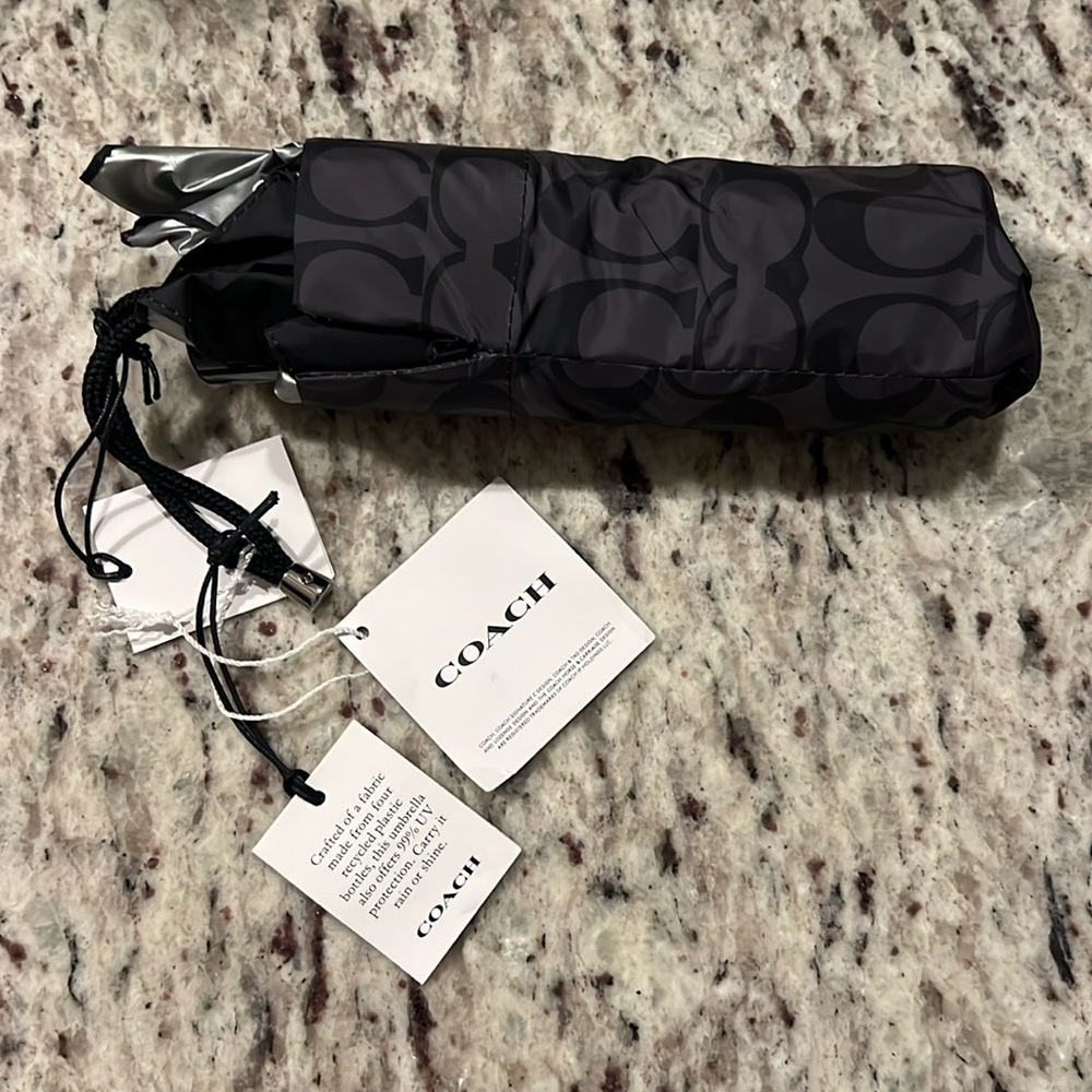 Brand new Coach black umbrella